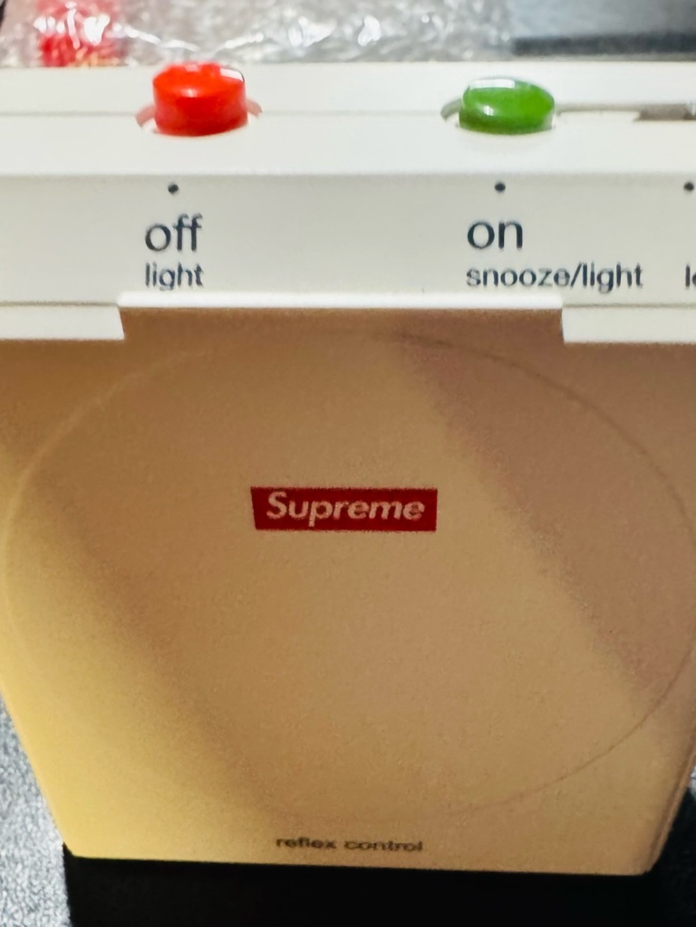 Supreme White Alarm Clock with Red Logo and Red/Green Buttons